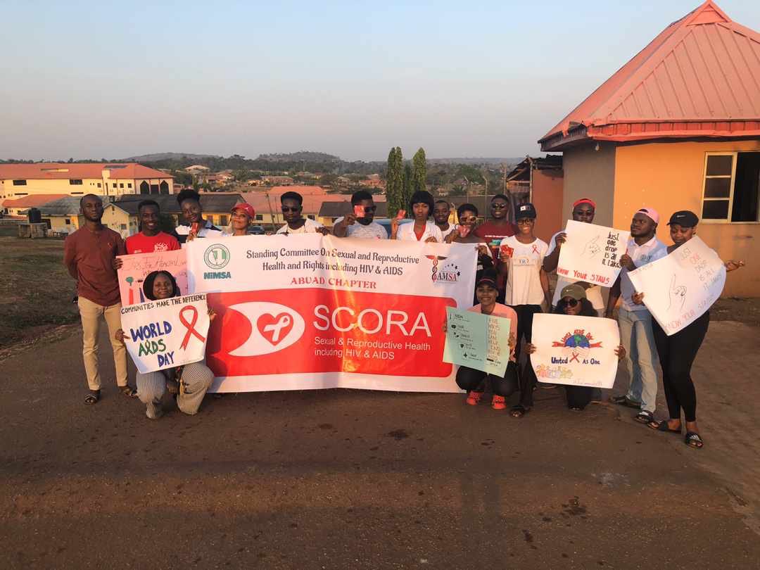 ZaddyAbdul's tweet photo. So over the weekend, NiMSA SCORA, ABUAD Chapter organised a WALK FOR AIDS, an awareness walk on HIV &amp; AIDS to commemorate the World AIDS Day. We started from Federal Teaching Hospital, Ido-Ekiti and walked through the streets of Ido community sharing the word on HIV &amp; AIDS https://t.co/hUpv5Tvnar