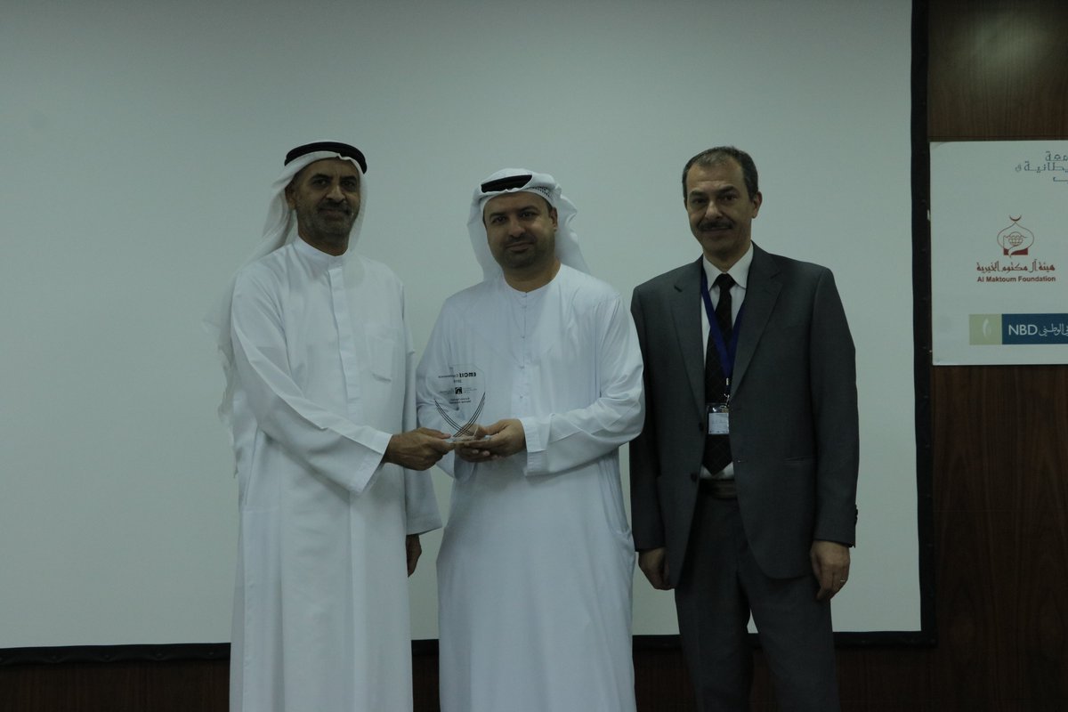 DCRI_BUiD's tweet photo. #DubaiBlockChainCentre CEO @drmarwan receiving a recognition award by #BUiD VC @shamsiuae58 for Co-Organising #EMCIS2019 @UNIC_ENG https://t.co/vkfQXJ3xhA