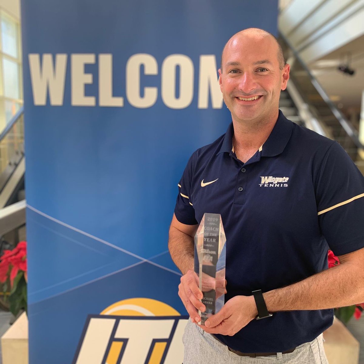 WU_Bulldogs's tweet photo. The 🐐 Getting some more hardware to add to the trophy case

The 14-time SAC Coach of the Year &amp; 3-time Region Coach of the Year picked up his 2019 National Coach of the Year award at the @ITA_Tennis Convention!!

#OneDog https://t.co/axzRMHfPnF