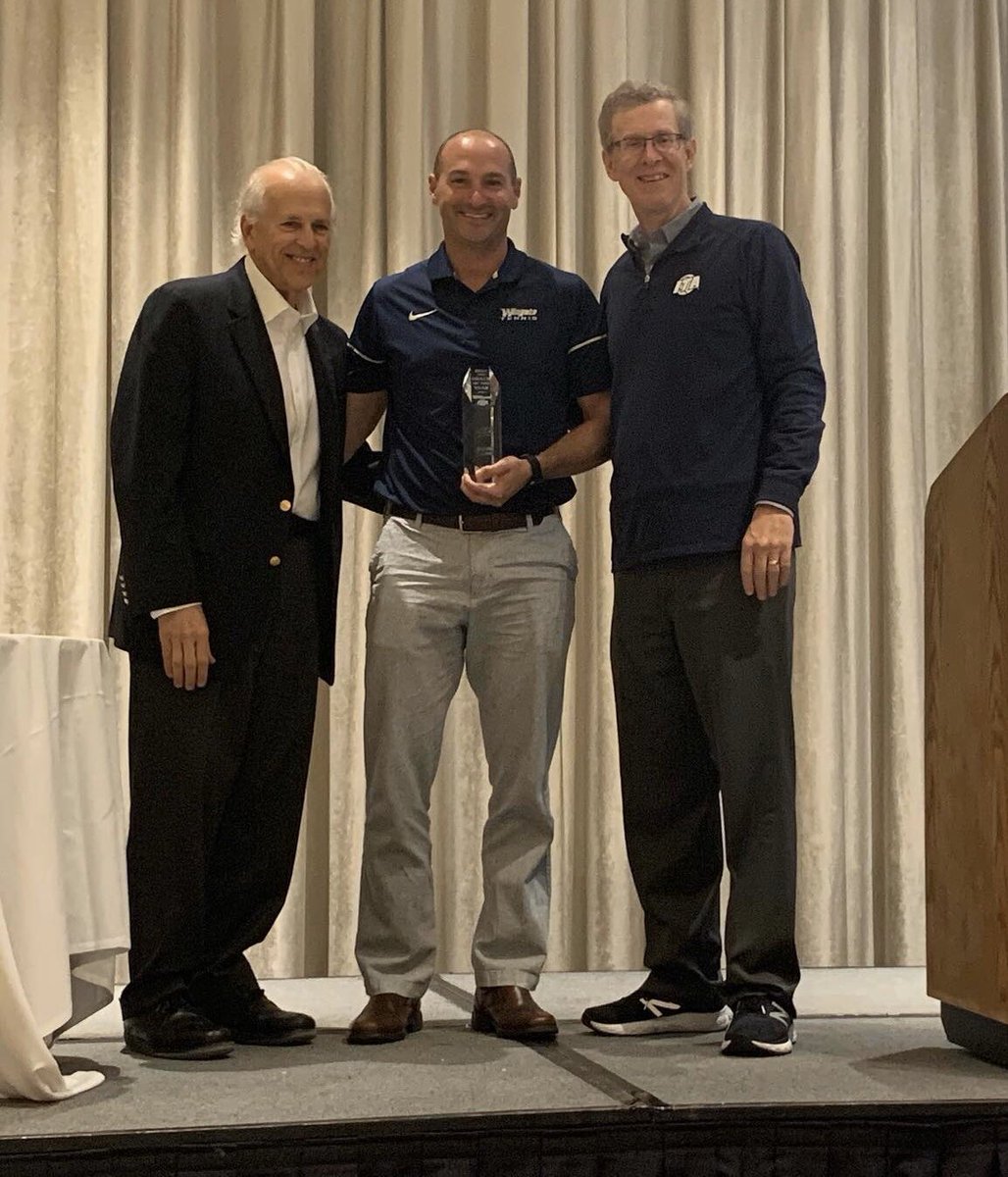 WU_Bulldogs's tweet photo. The 🐐 Getting some more hardware to add to the trophy case

The 14-time SAC Coach of the Year &amp; 3-time Region Coach of the Year picked up his 2019 National Coach of the Year award at the @ITA_Tennis Convention!!

#OneDog https://t.co/axzRMHfPnF