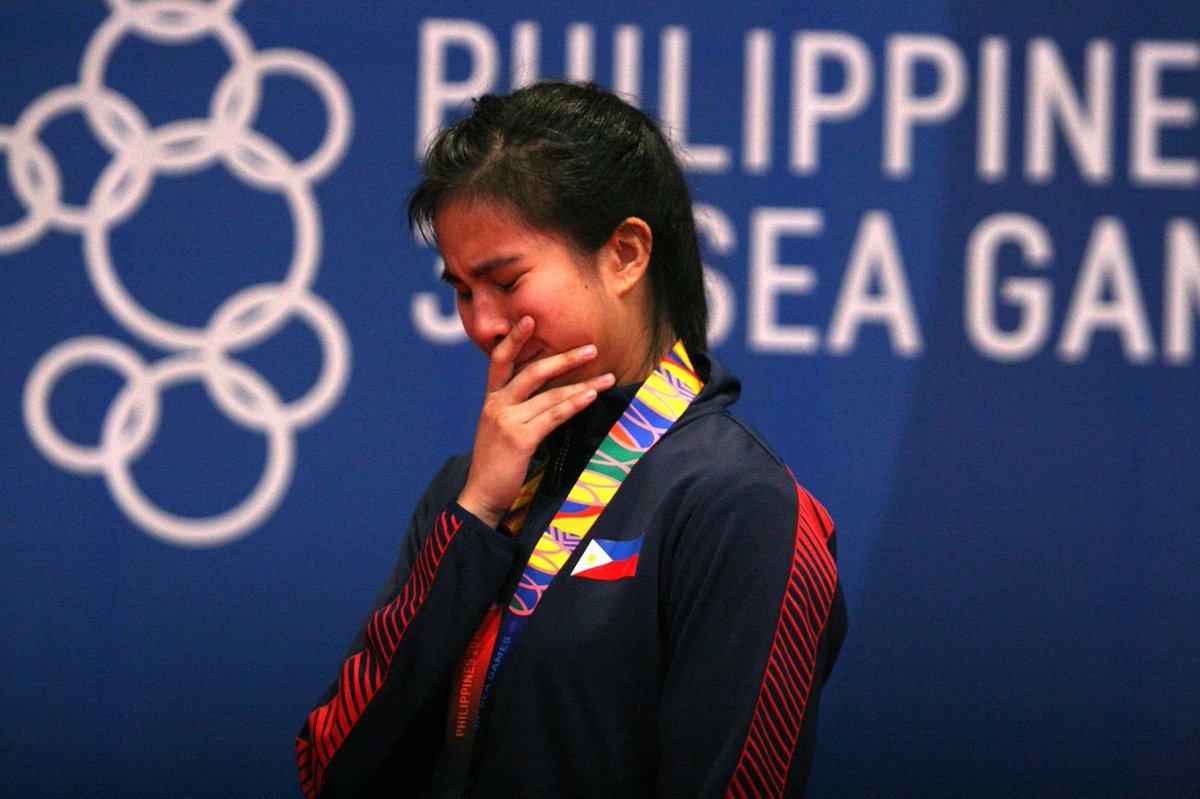 gmanews's tweet photo. LOOK: Jamie Lim capped a dream year with a gold medal in the Southeast Asian Games in karate.

The daughter of PBA legend Samboy Lim and former Pag-IBIG Fund CEO Darlene Berberabe broke down in tears during her medal ceremony, shortly after her victory. https://t.co/19AJIAHc1M https://t.co/t67WvwPnqe