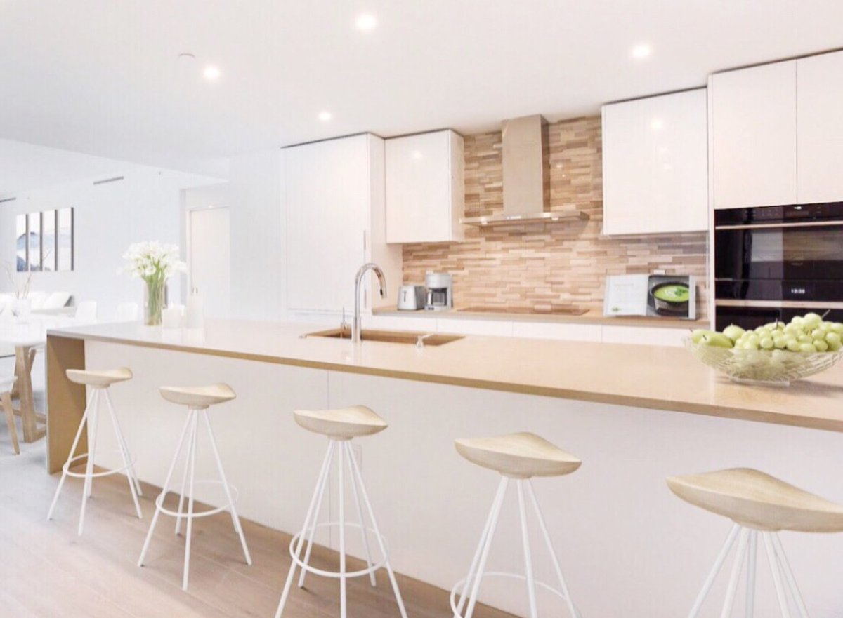 Furnished with a large countertop, this kitchen at #AquaBlu is fit for a night of entertainment with family and friends 🍾 To learn more, please call our sales center at (954) 530-7116.