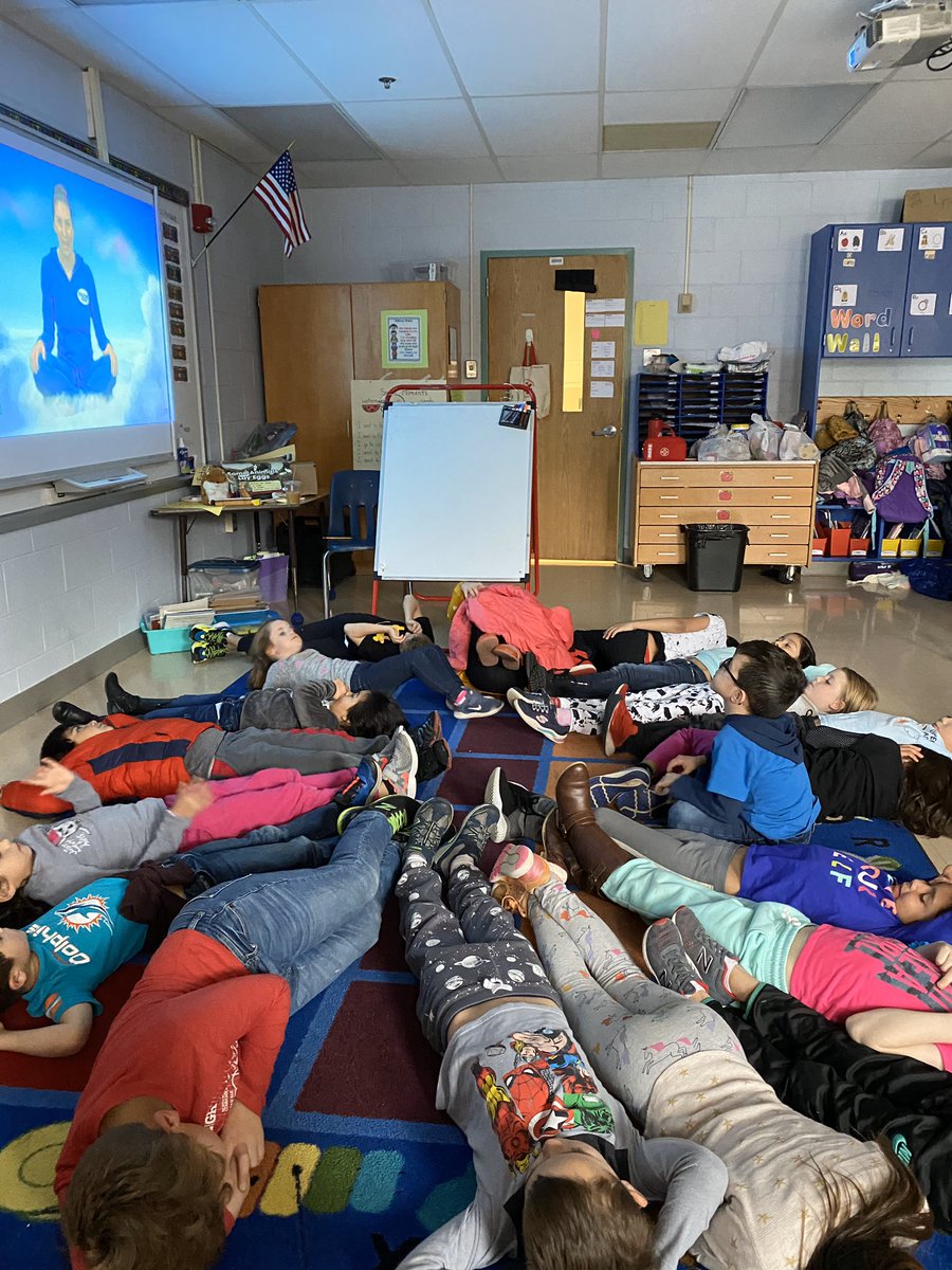 CPES1stGrade's tweet photo. First graders take a moment of zen by meditating and practicing mindfulness in the classroom. #cpesbelieves in promoting student wellness https://t.co/JjNPakocsO