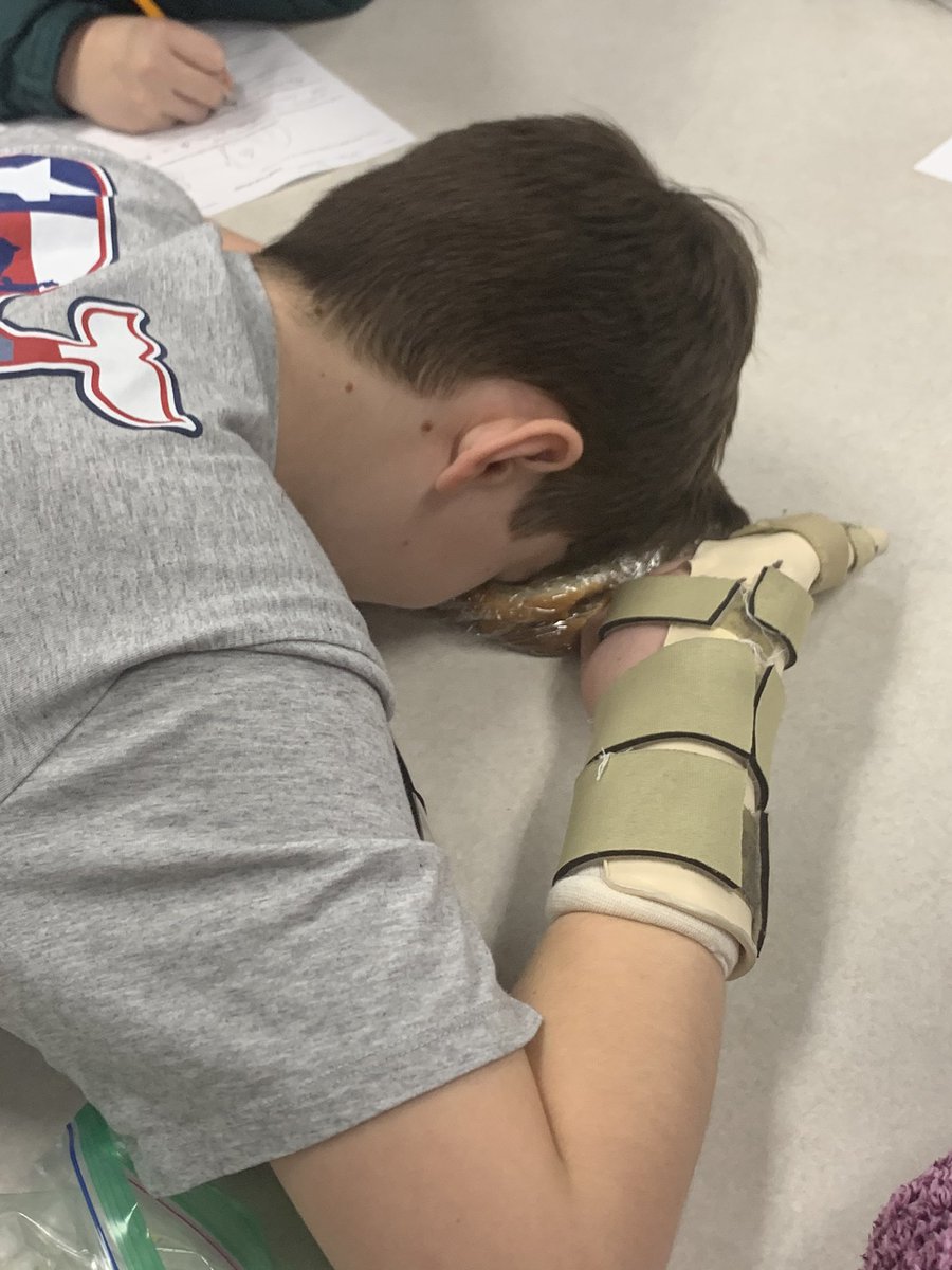 This looks like an exhausted student...but it is a student using his head to simulate pressure on his fossil fuel bread model. Imagination at its finest. #fortconchoiuniversity
