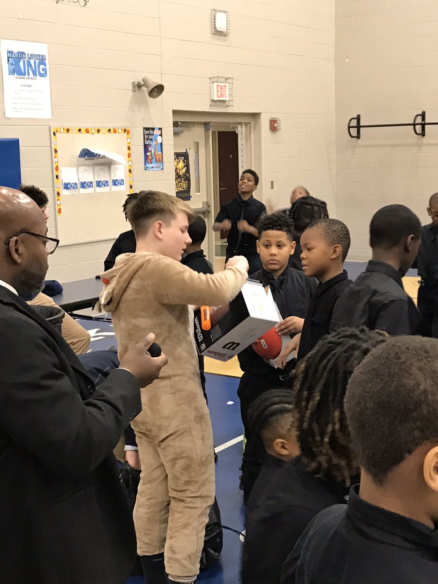 StJohnsJesuit's tweet photo. Today students and administrators delivered gifts and Christmas cheer to MLK Academy - a tradition we love at SJJ! #JSNadvent #MenForOthers https://t.co/0ToYpRS8Cd