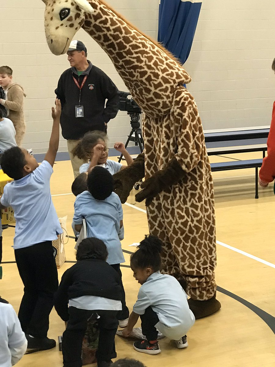 StJohnsJesuit's tweet photo. Today students and administrators delivered gifts and Christmas cheer to MLK Academy - a tradition we love at SJJ! #JSNadvent #MenForOthers https://t.co/0ToYpRS8Cd