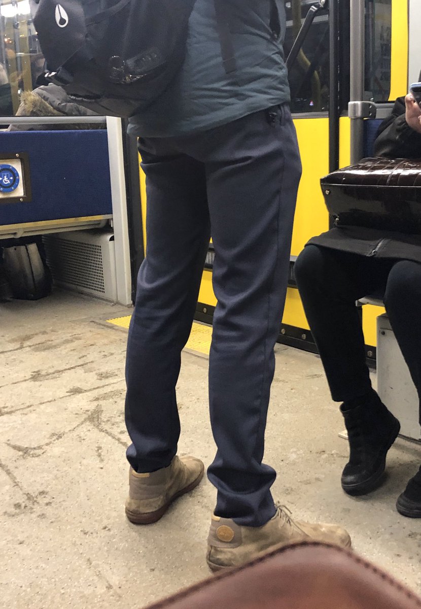 YEGLRTObserver's tweet photo. Standing subject A had no concept of personal space ettiquitte.  Moving hips and stretching right in front of sitting subject B.  In short, when there is empty space - use it.  Especially for LRT calisthetics. #yegtraffic #LRTtips https://t.co/mKRYTJhqcs