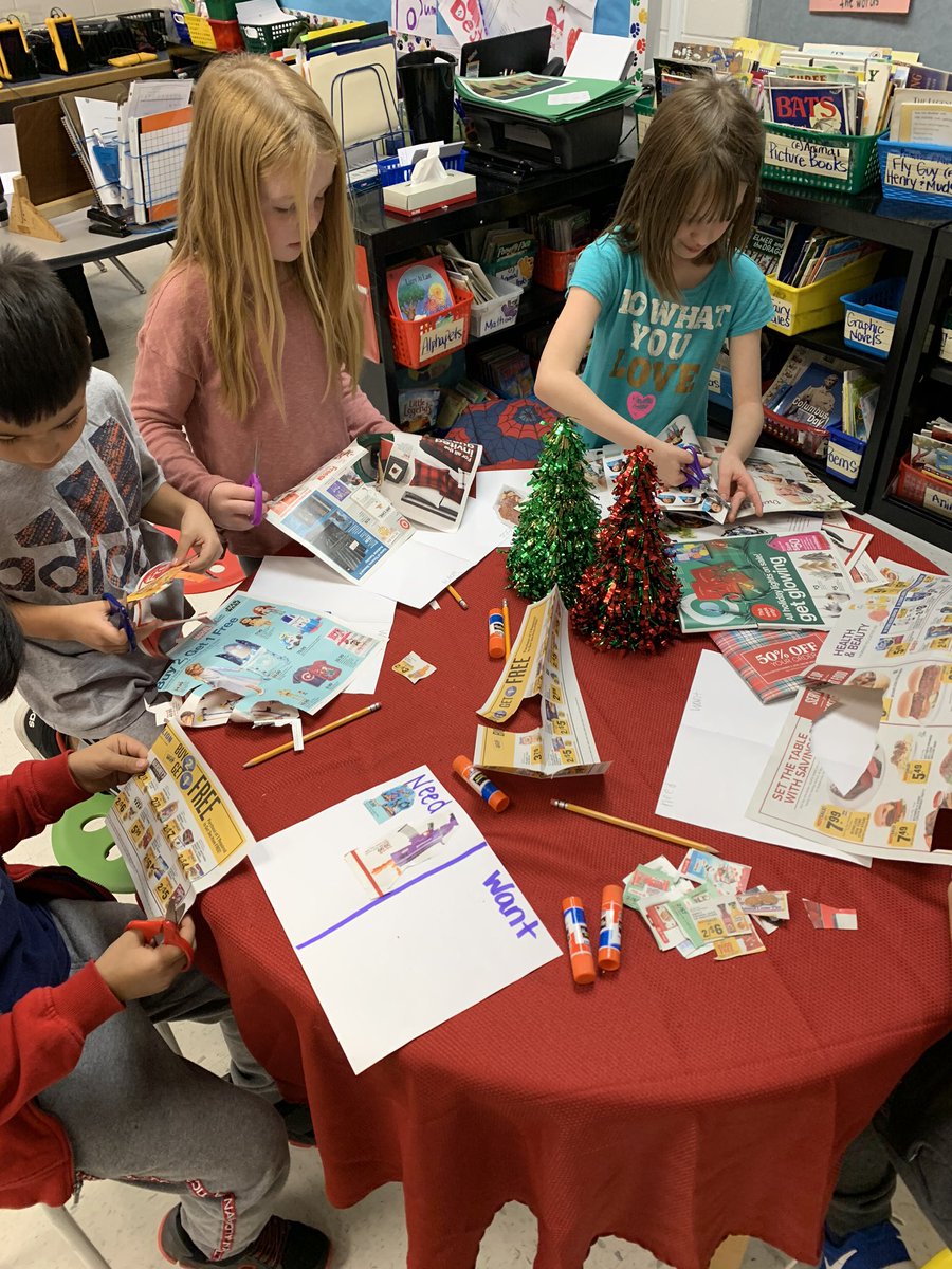 MrsNortonBMES's tweet photo. An inquiry into economics!  The kids cut out pictures and then sorted them into categories.  We will use these to develop questions, expand our learning about needs and wants, and write an opinion piece to convince someone to get us what we want! #pawsitivelypawsomein2ndgrade https://t.co/PnFuo92IDN