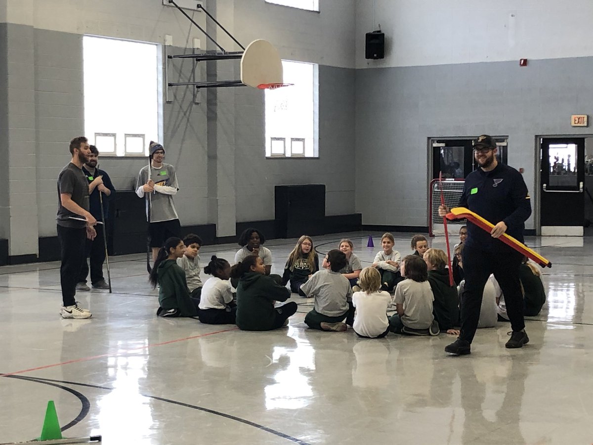 Strochschool's tweet photo. St. Louis Blues Crew came and helped Mr. Staaby teach the fundamentals of hockey and donated equipment to the school! The students had a blast! Let’s Go Blues! https://t.co/vkbvQ6An4a