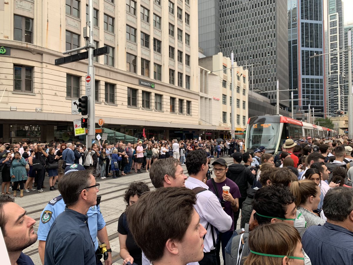 Folks on each side of the tramway. Allowing the trams to roll in and out.