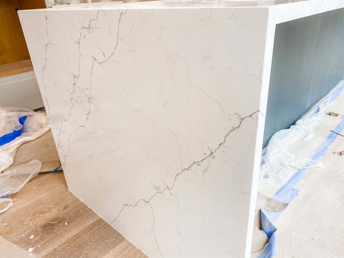 HGC_Designbuild's tweet image. This kitchen from our #baysideproject is definitely a work in progress, but it’s going to be a stunner when it’s finished. The veining in this waterfall countertop being installed is 👌and makes us So. Darn. Happy!