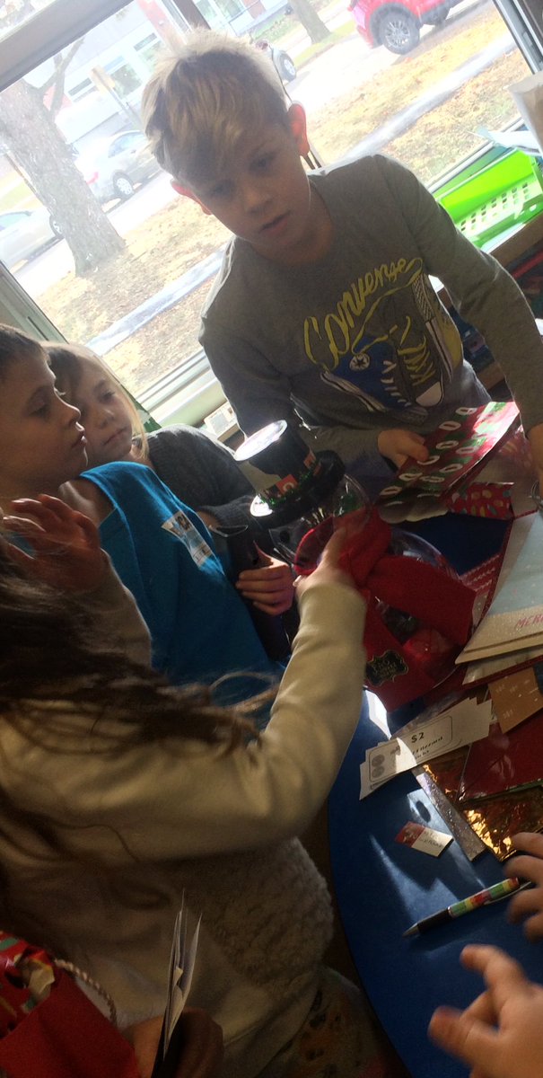 Holiday Ecomarket! Students had fun selling and purchasing gently used or unused gifts from home with $50 blizzard bucks and reused gift bags. Each student is coming home with 3 wrapped gifts for loved ones. #Ecoschools #frankpanabaker