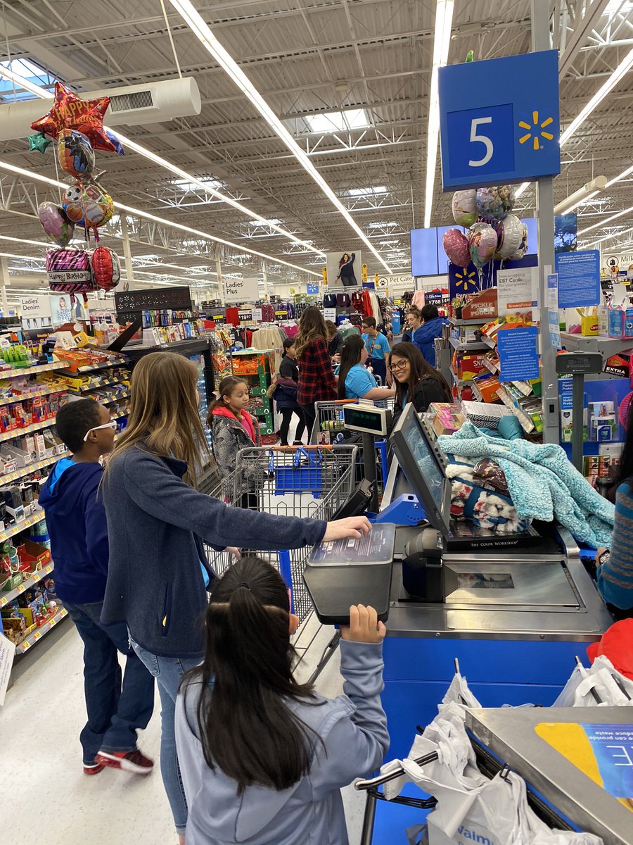 We teamed up with Florence Wilson Stuco to spread some holiday cheer in our community! We also about shut down Walmart!