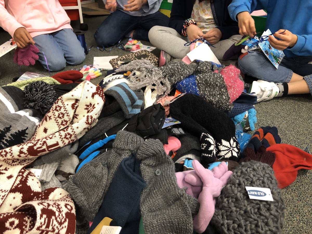 MrsNealon's tweet photo. We estimated the donations, then attached holiday cards and ribbons to wish everyone a warm winter ❄️ #holidayhereos #yrp @johnmccraeps Tomorrow is the last day to bring in some mittens for the Mitten Tree! 🌲@MilesMessages https://t.co/6Sb2CvzHvK