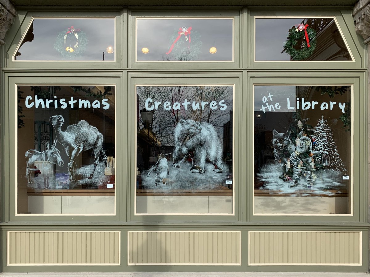 PiquaLibrary's tweet photo. We're happy to have Michael Glass back again to paint our front windows for the #holidays. Our theme for this year’s holiday display is #ChristmasCreatures from Around the World. Follow @artbymichaelglass on FB to see more of his beautiful artwork. #Piquibrary #PPLHolidays https://t.co/Amj1nLXFZW