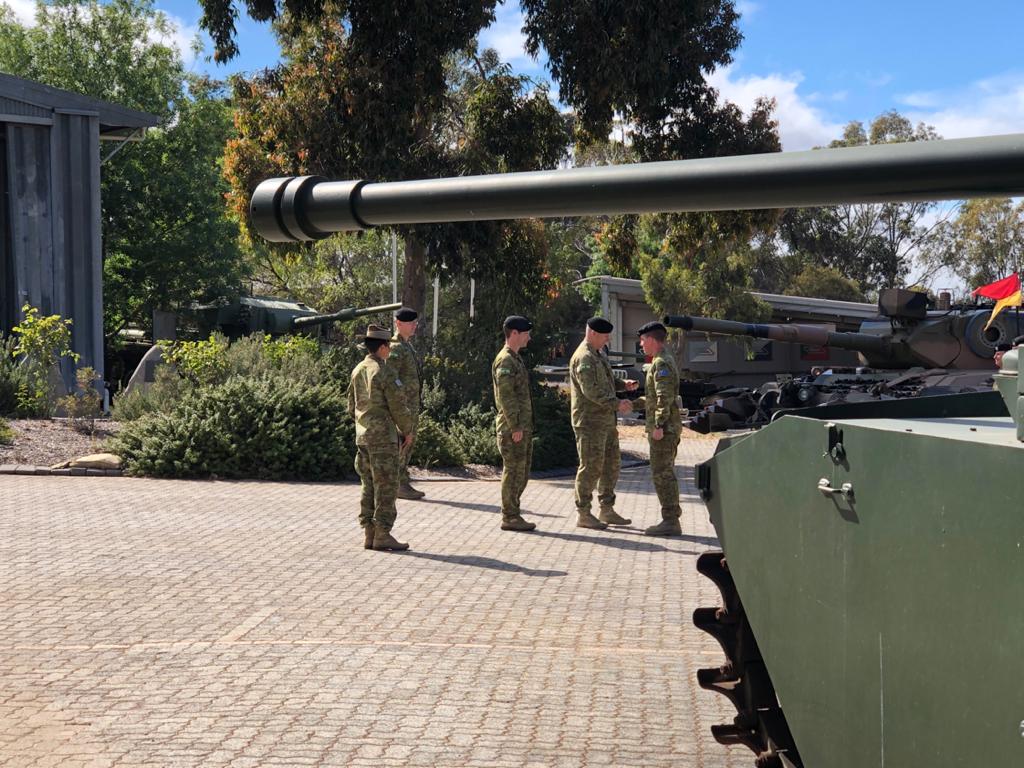 The last drivers course for 2019 marched out from @SOARMDAusArmy today. 9 new M1A1 drivers on their way to @1_Armd_Regt @2CAVREGT and 2/14 LHR (QMI). The CO presenting the members with their berets while I present them with unit patches #goodsoldiering #armyinmotion