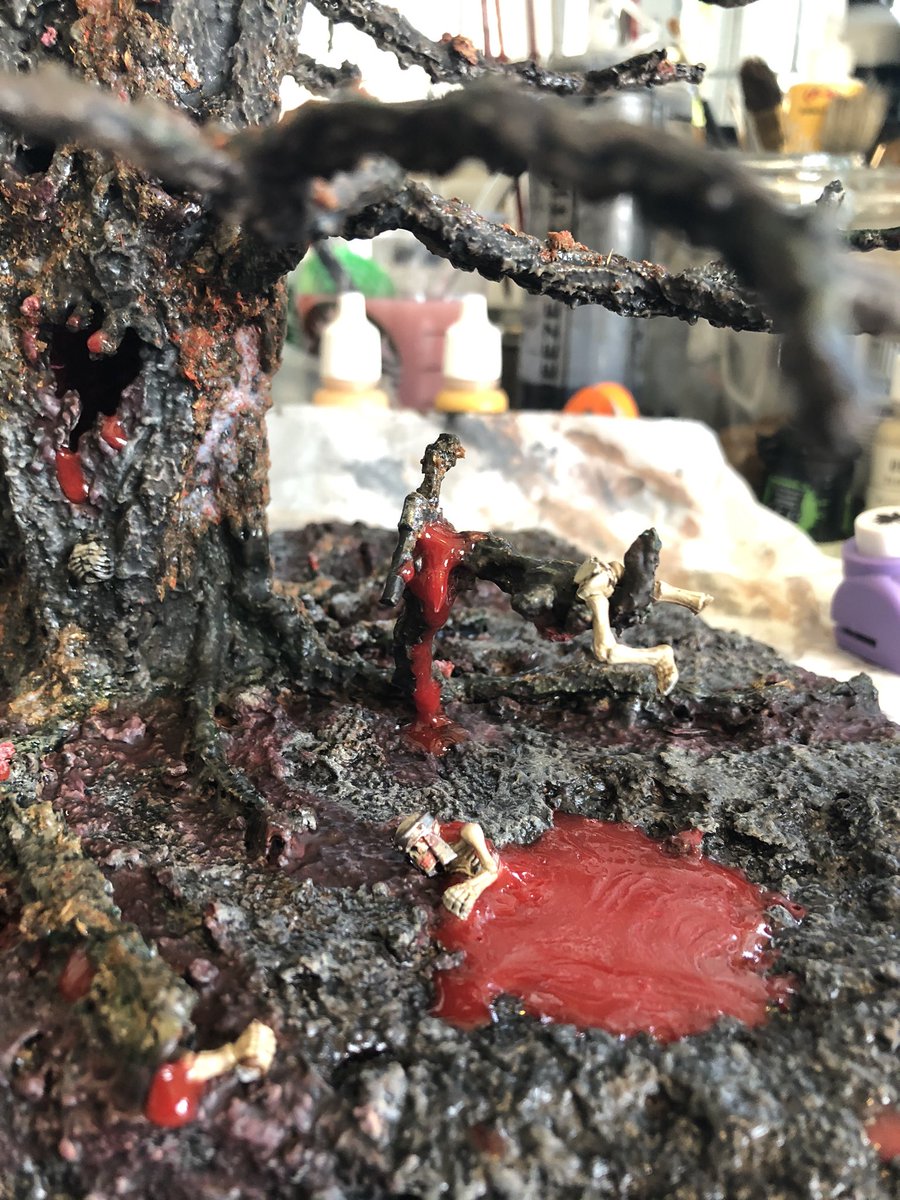 QuokkaBrain's tweet photo. If it bleeds we can kill it! The tree slowly absorbs the bones of an unlucky adventurer, to increase in power, the flesh having already been devoured by the roots. #WIP #dndminiatures #28mm #eviltree https://t.co/RhqYmuHGfs
