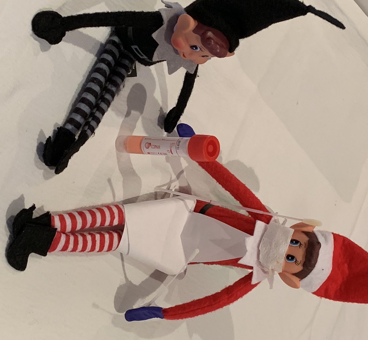 ipc_uclh's tweet photo. Day 3 of Elfie's first week. one of the wards called about a patient how had a runny nose, spiking temperatures and had a sore throat.  Its looks like poor Elvis has the #Flu so Elfie has taken a copan swab.  we'll let you know the result later. https://t.co/SjciDiYokY
