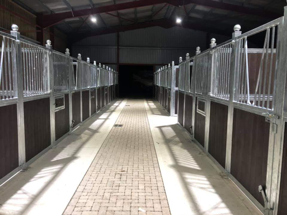 StablesOnline1's tweet photo. Today’s Premium Range Installation near Gloucester. 10 Full Height Stables with Swinging Doors ( with fixed anti-weave grills), Hay Mangers, Hay Doors and Swivel Mangers. Also a standalone wash bay, solarium and tack up areas. All in brown plastic. Ready to be matted #stables https://t.co/zFIB5OYdfp