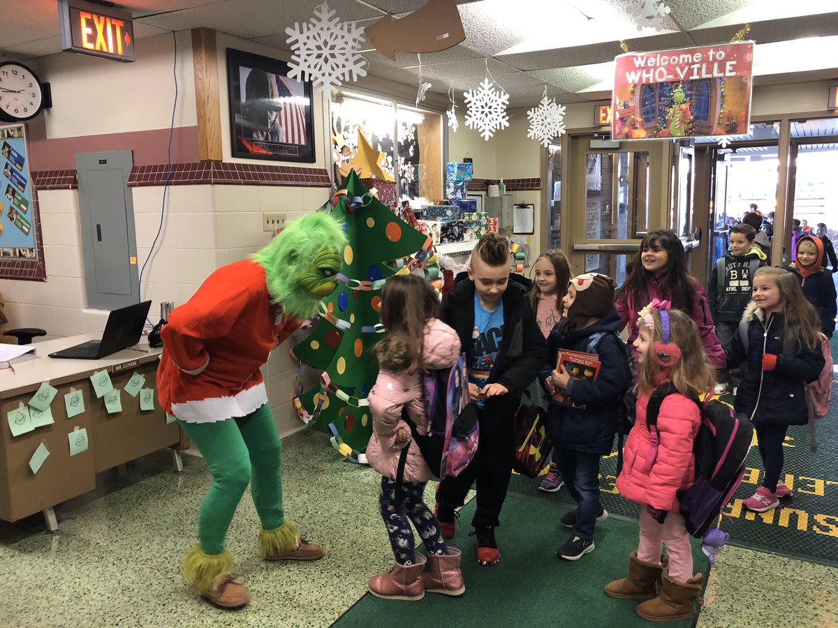 SunriseElemK5's tweet photo. Look who made an appearance during our Grinch event this morning!  😂 

I’m sure the Grinch was trying to influence the purchase of Grinch cards and not Cindy Lou Who’s!!  🤣

#grinchweek #eastpt https://t.co/rUGSUiJKcw