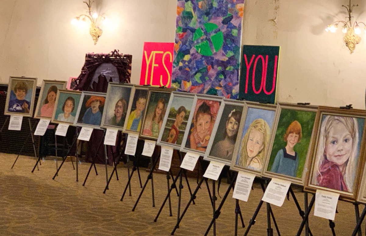 Paintings of children who have lost their lives to gun violence.