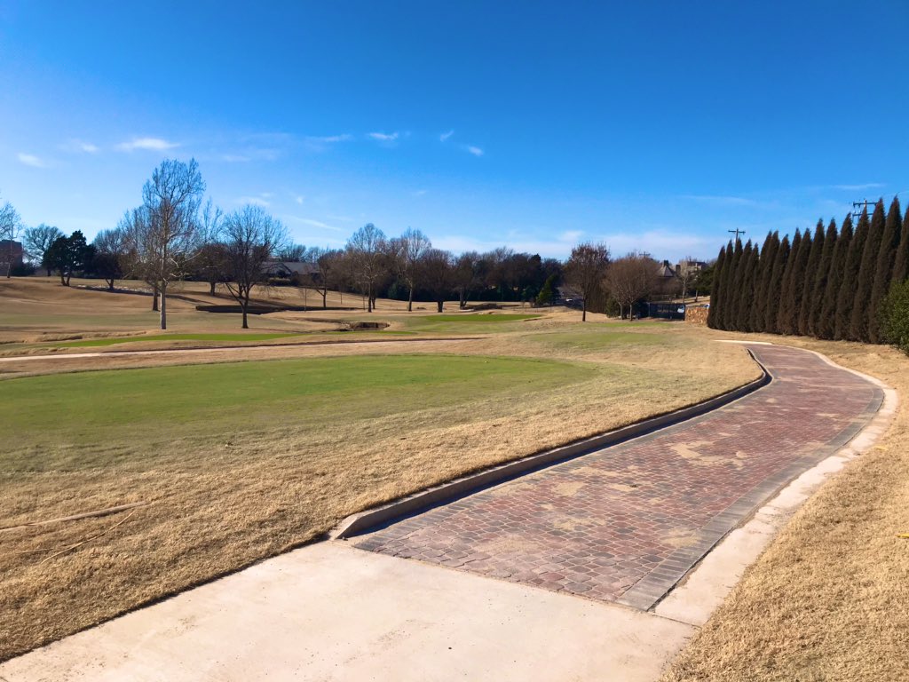 Garrett_Barnes's tweet photo. As part of our 2019 renovation, our turf crew prepped and laid over 24,000 square feet of pavestone next to tees and greens- totaling 1/3 of a mile long. Couldn’t be more proud of our crew here @okcgccgolf. Absolute outstanding work from our guys. #PavestoneComplete https://t.co/QQABuKrqLH