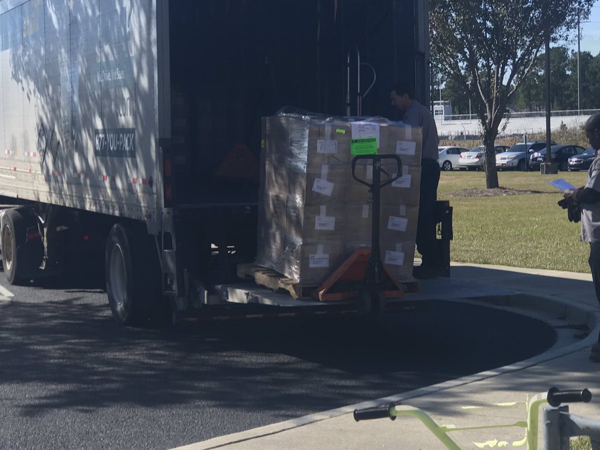 MHESLibrarian's tweet photo. Great News!  Mount Holly Elementary School’s library got a lot of new books in November. Just look at the boxes of books coming off the truck! @MountHollyElem https://t.co/Ve0x5RzjXA