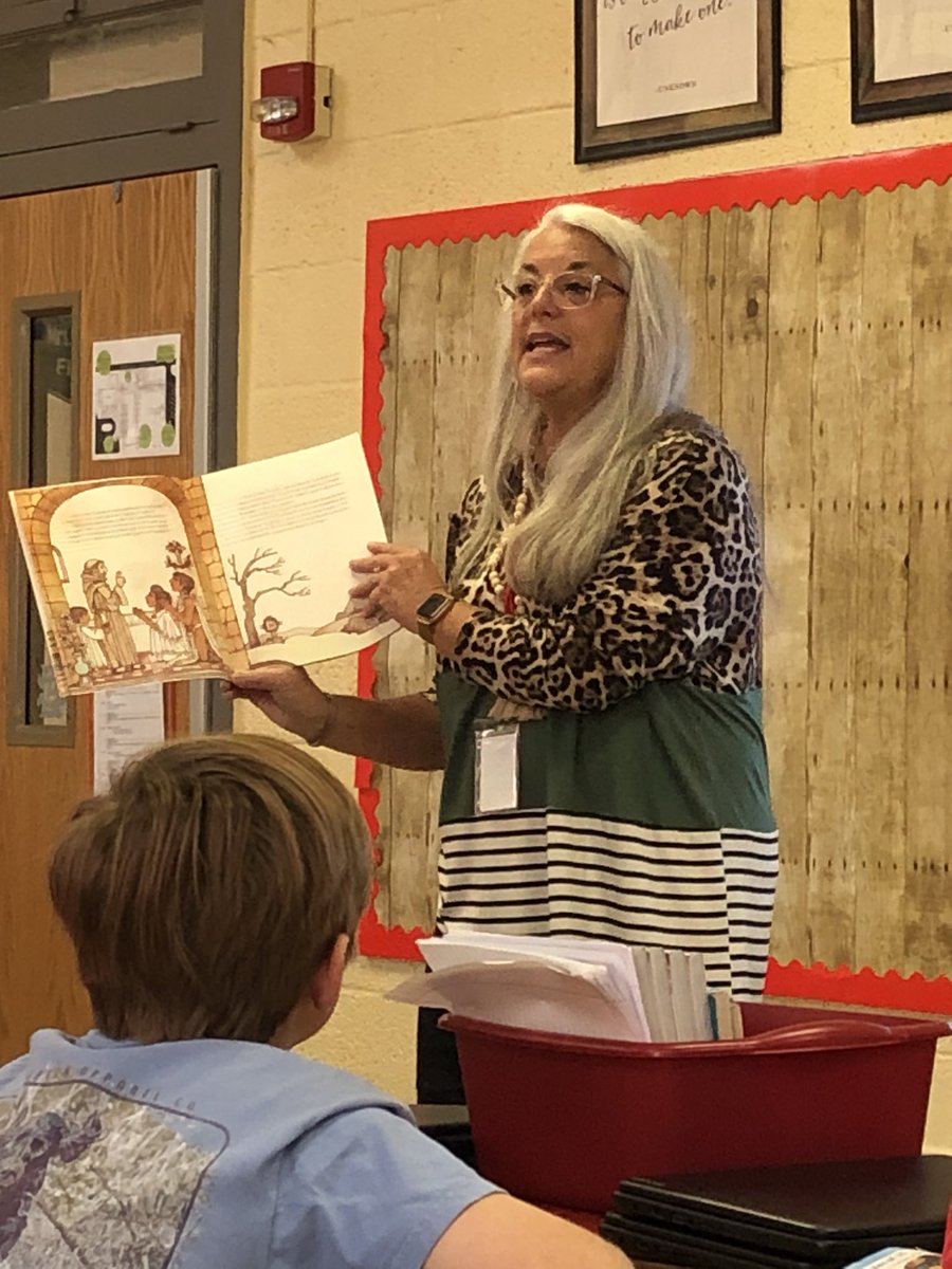 bjphipps2002's tweet photo. Mystery Reader, Mrs Valera Goff, reads to Mrs Celeste’s 5th grade class today! #WeLeadWGE #KidsDeserveIt https://t.co/jApUv96iNL