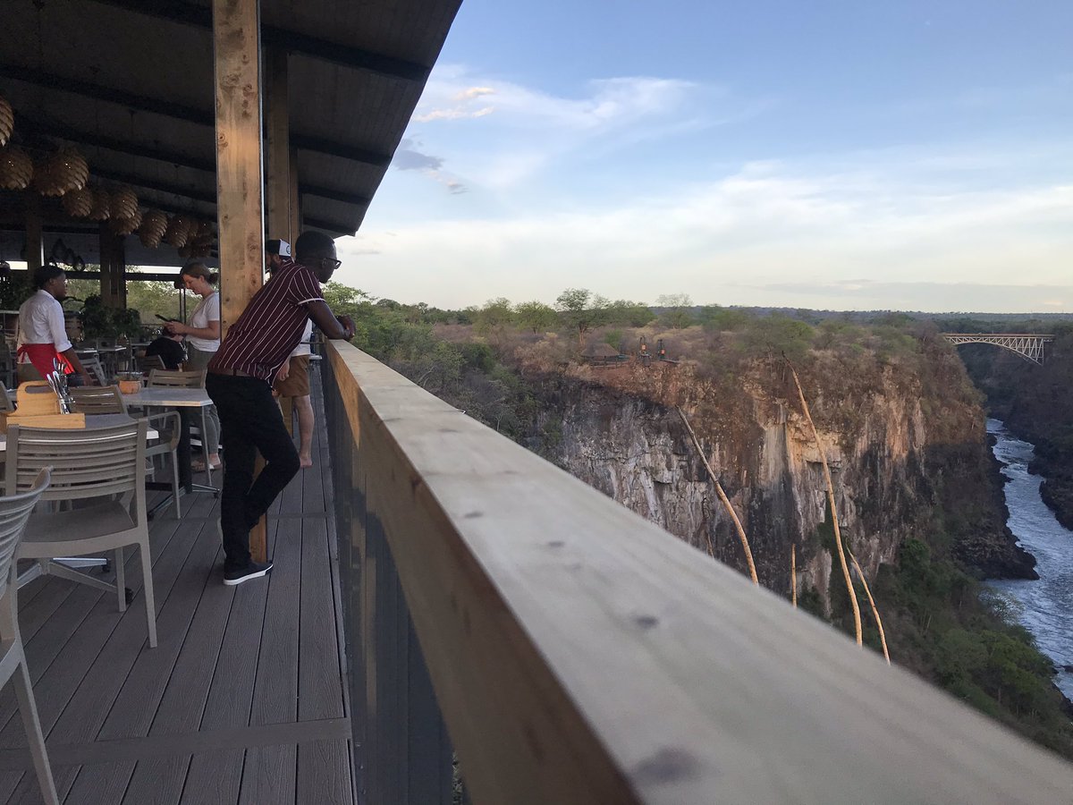 EChinene's tweet photo. Enjoying Beautiful chill out places in Victoria Falls. Pleasant views of the natural landscaping, Gorges, Zambezi River and the Bridge #theLookOutCafe https://t.co/1i9hkfsnOI