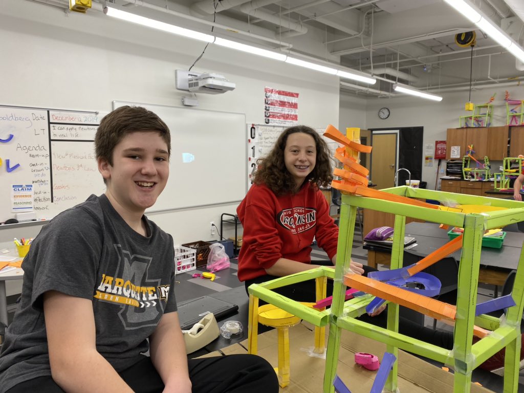 GoldbergTeach's tweet photo. @MLMSmuskies Ss came in during homeroom to do extra work on their paper roller coasters. We will mathematically determine the speed and acceleration of the marble when they are done. #pbl #handsonlearning #authenticlearning https://t.co/OomxPV70jP