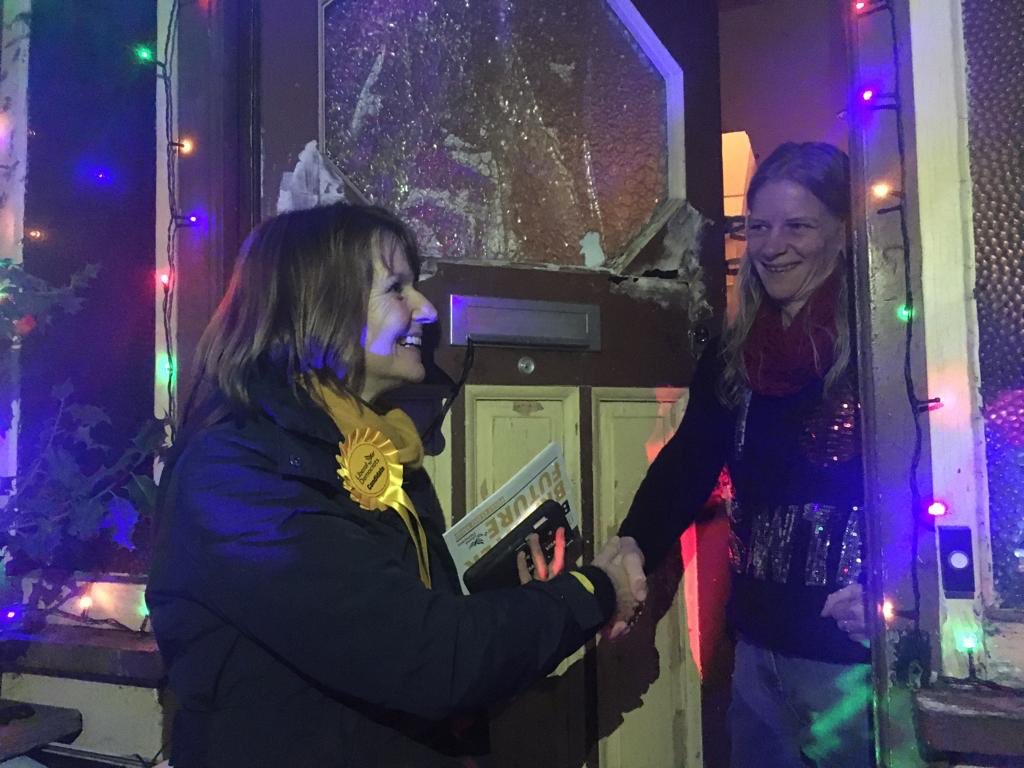 PaulaWFerguson's tweet photo. I’m now out meeting voters in #ChandlersFord with Cllr Tim Groves. It may be wet and cold but the Christmas lights are amazing. Please come out, vote and help me win. Also great to see the re-opened Fryern Post Office buzzing. #Paula2Win https://t.co/395cwoKWOm