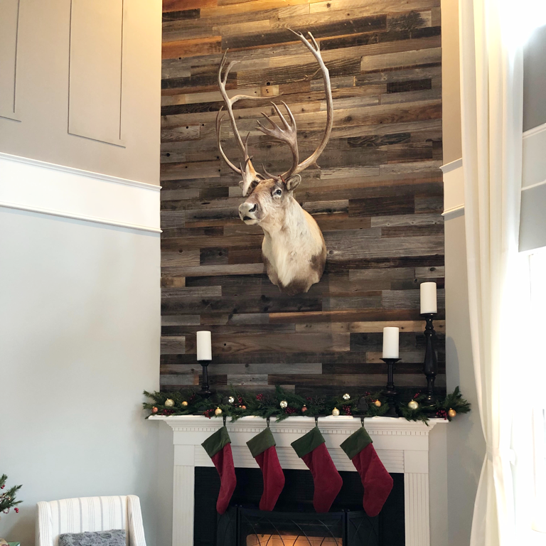 "I love my completed fireplace renovation! Your reclaimed barnwood product was so easy to install. I rented a scaffolding and did it all myself. I goes up 20 feet and makes such a beautiful statement wall!" Way to go, Julie! It looks amazing! 🙌 #DIY #christmas
