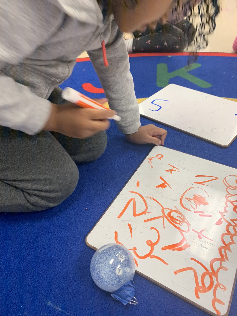 Hide and seek letter find in the ornaments! Students are finding the letters in the sand and writing them on their white boards during small groups! #d97 #gottabeD97 #weared97