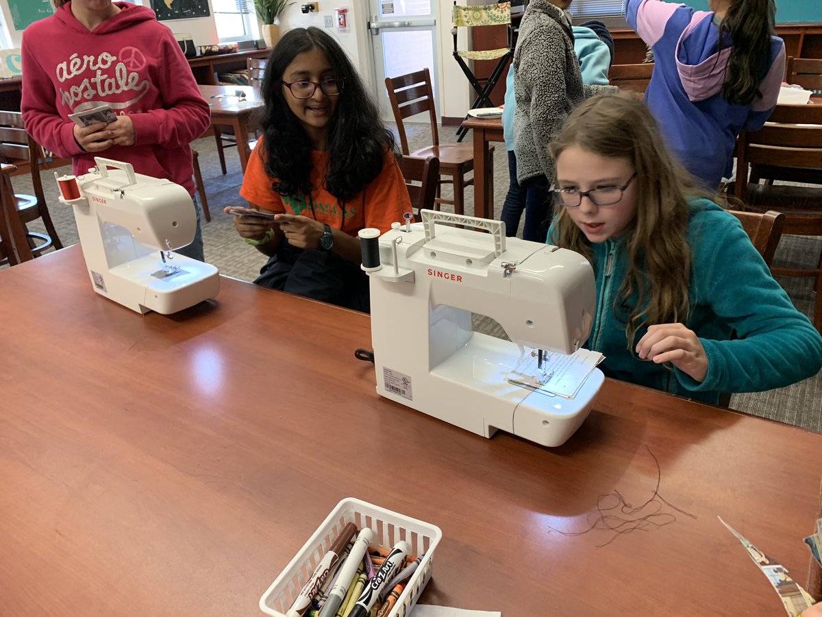 rhiajean's tweet photo. Our 2nd Annual Christmas Craftursday was a hit! Kids and teachers used our makerspace sewing machines to create ornaments from book pages! #wylieisdlibs #draperdriven https://t.co/G7uEDu7IgZ