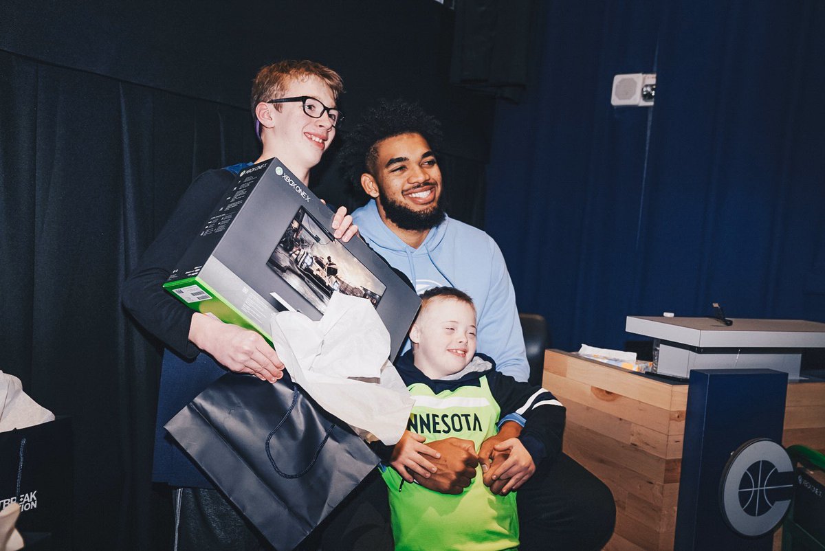 Timberwolves's tweet photo. Karl Claus came early!!! 🎅🏽

@KarlTowns surprised 25 #HopeKidsMN families with an XBox One X, goodies from @beatsbydre, a free movie screening, and more to celebrate the holiday season! https://t.co/sqlf5TdKLh
