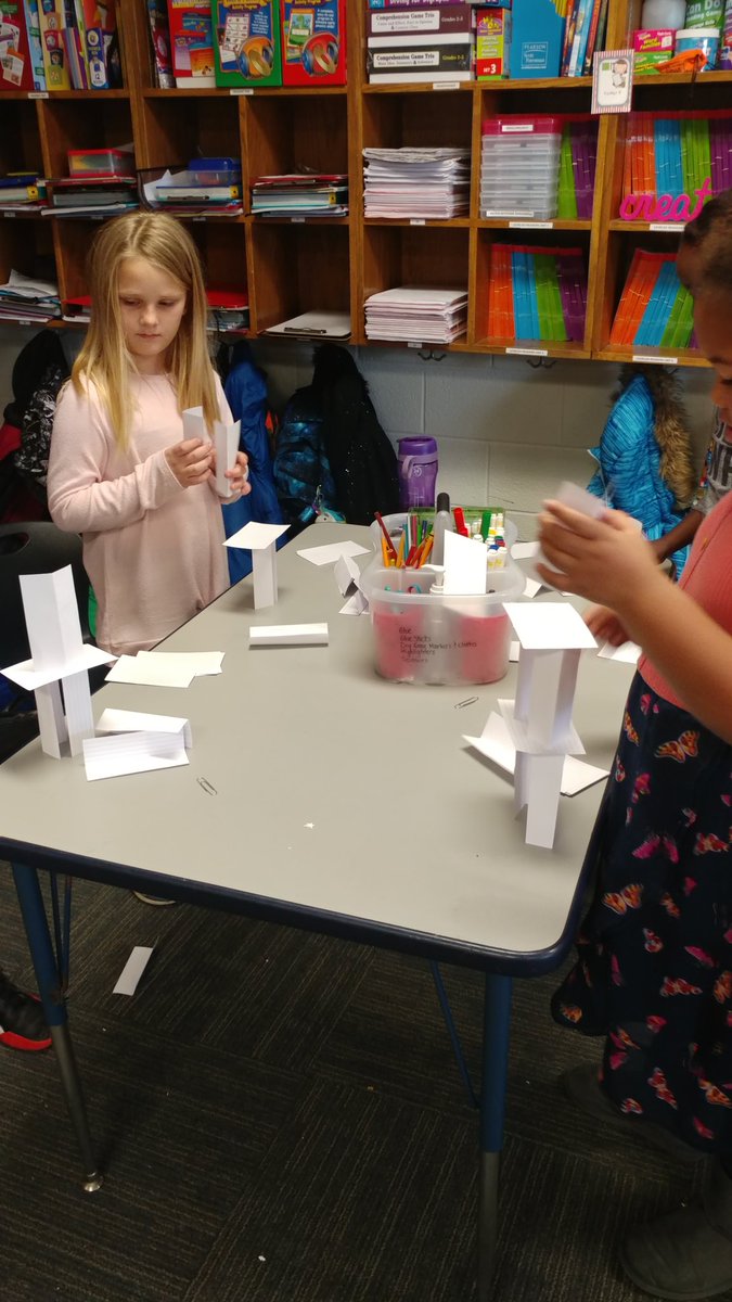 Robyn_2ndGrade's tweet photo. Can you build a house out of paper? Learning about material properties and having a challenge over the tallest tower! #dhefamily https://t.co/HZpO2lFnbu