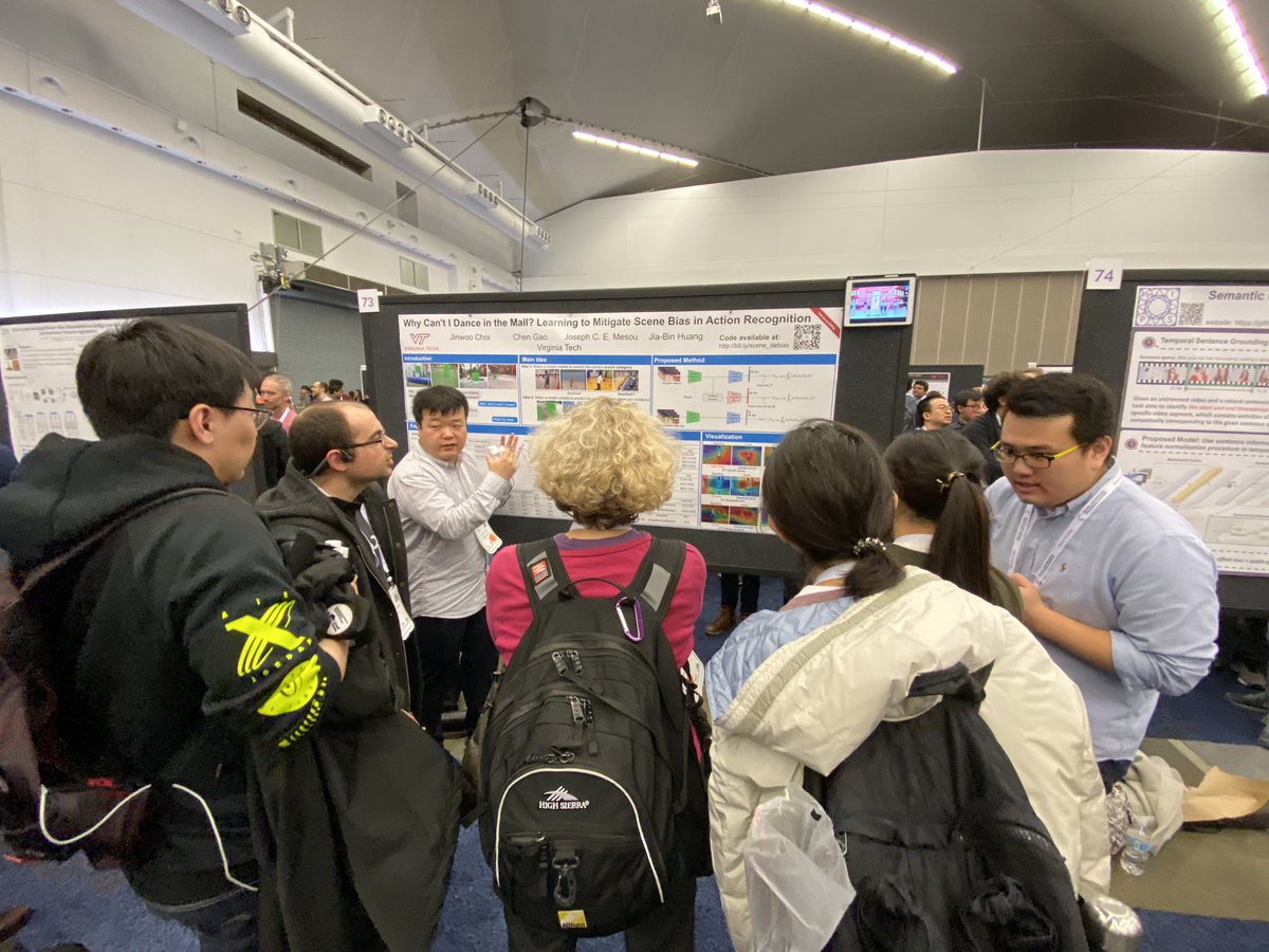 Jinwoo and <a href="/gaochen315/">Chen Gao 髙諶</a> presenting our work on mitigating scene biases in action recognition. #NeurIPS2019