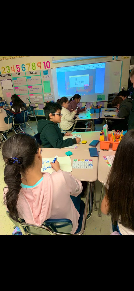 ITTeam6Two's tweet photo. Today Team 6-1 and 6-2 worked together and played fraction Bingo to prepare for their assessment tomorrow! The students loved working with friends from different math classes! #asd4alll #itbebrave https://t.co/LTxwmD63yT