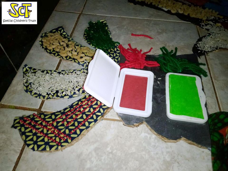 SCTUganda's tweet image. At Dawn Children's Centre we got our creative hats on this week and re-purposed our end of year concert costumes into small sensory boards. #SensoryBasedPlay #SensoryBasedLearning #ChildFriendlyDevelopment