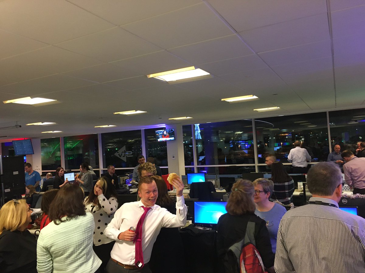 vanessataaffe's tweet photo. A happy newsroom after an eight hour broadcast, an even happier @STVRonnie with his bacon roll #stvelection https://t.co/MgCahelUS5