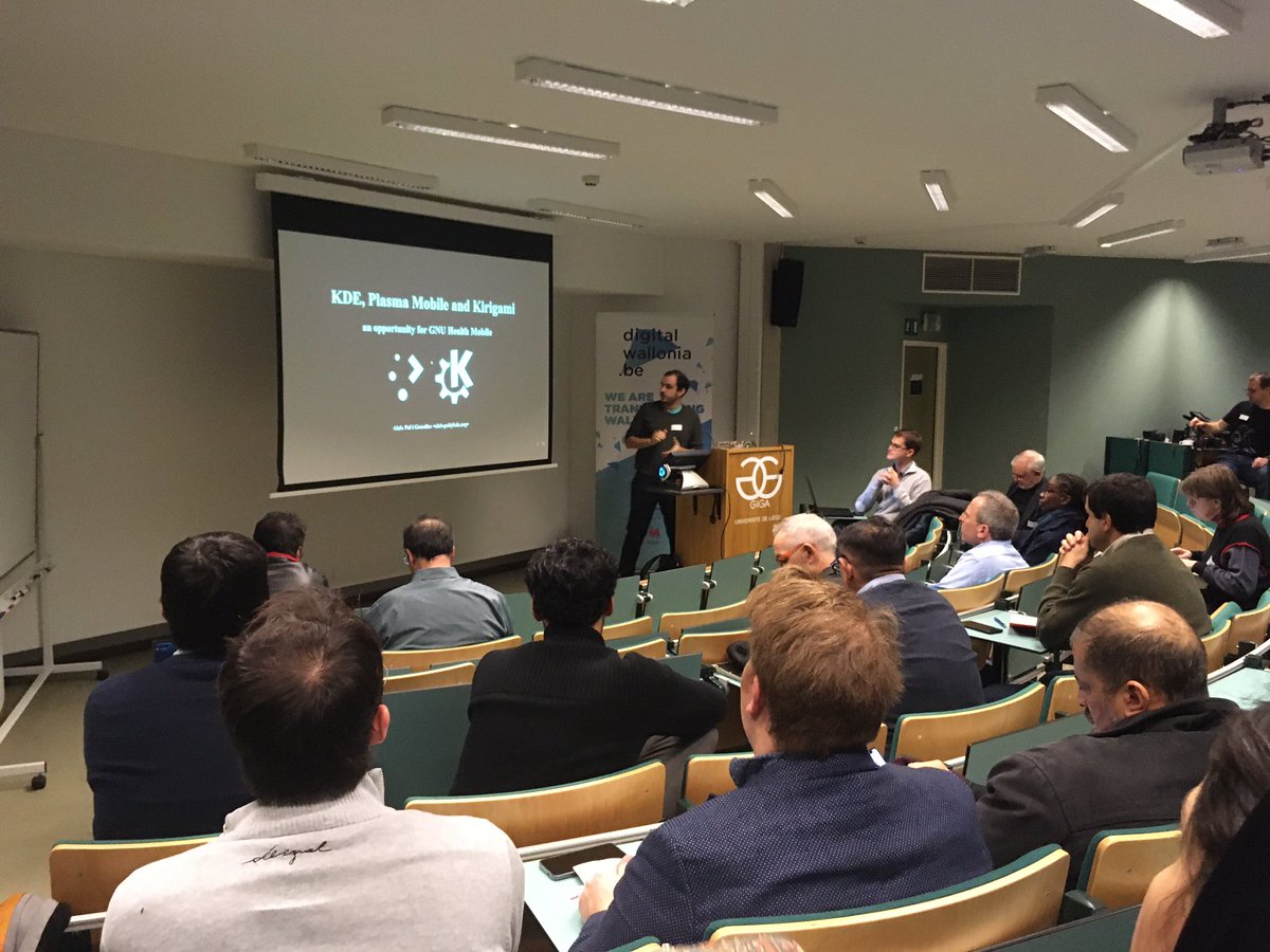 openSUSE's tweet photo. @AleixPol discussing @kdecommunity, Plasma Mobile and #Kirigami at @gnuhealth @OrthancServer conference bringing about a GNU Health Mobile opportunity. https://t.co/RvTPrLjzsj