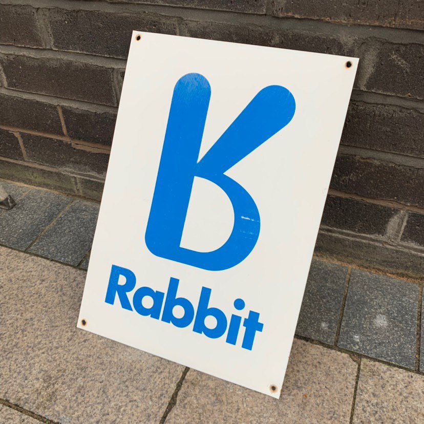OfficialM3HHY's tweet photo. The very proud owner of an original Rabbit Telepoint sign. This one was sat fading away on the side of a local shop so after many phone calls and emails I managed to save it. It now takes pride of place in my shack. @NigelLinge #rabbit #telepoint #telephone #phone #phonehistory https://t.co/q00bPuJDx5