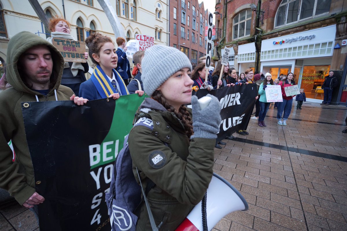 AnnaKernahan's tweet photo. Climate strike week 15. Striking with @ys4cbelfast today! 
Bitterly cold and rainy but we were kept strong by anger from climate being ignored in the #GE2019 
#ClimateChange #ClimateEmergency #climatestrike #ClimateActionNow #ClimateJustice https://t.co/hYBd9B3OiK