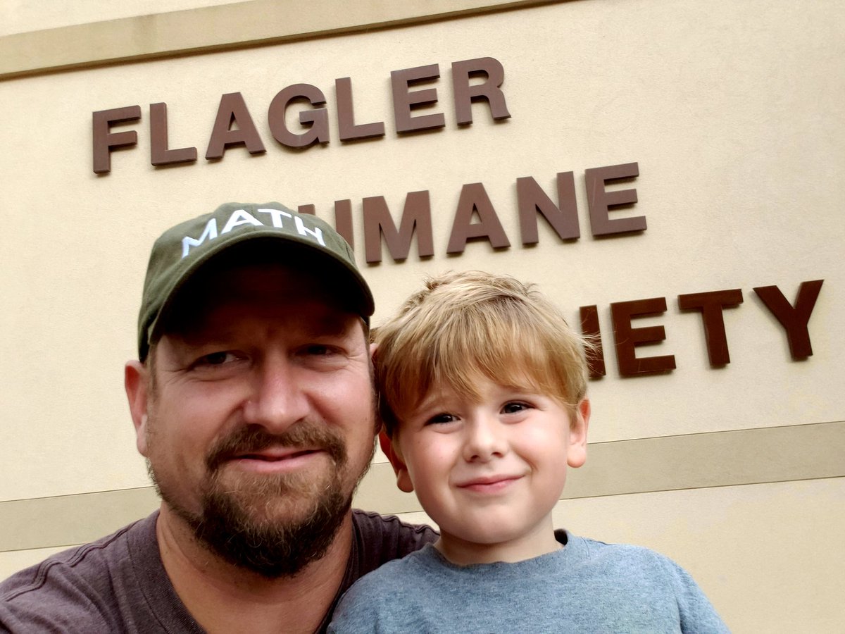 scottwdustin's tweet photo. Giving the animals some love with my son! @FlaglerHumane @AndrewYang #PledgeForHumanity #HumanityFirst #FundAndrewYang #YangGang https://t.co/Agg3bciOMs