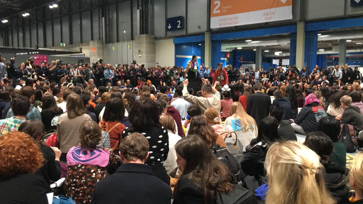 WGC_Climate's tweet photo. People united, will never be defeated! Civil society, across constituencies, is doing a sit in today at #COP25! This was definitely not the "people's COP" @COP25CL promised us, but there is power in solidarity!
#COP25 #climatestrike #TimeForRealAction #feministswantsystemchange https://t.co/Xb7M7KWN13
