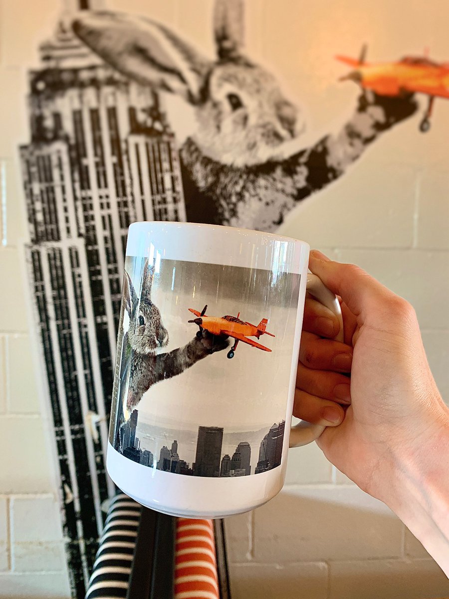 King Kong ain't got nothing on us 😎🐰 Now you can bring our KING BUN mural to your home with these NEW, exclusive mugs — now available for $10! Get yours today at our Grandview location.