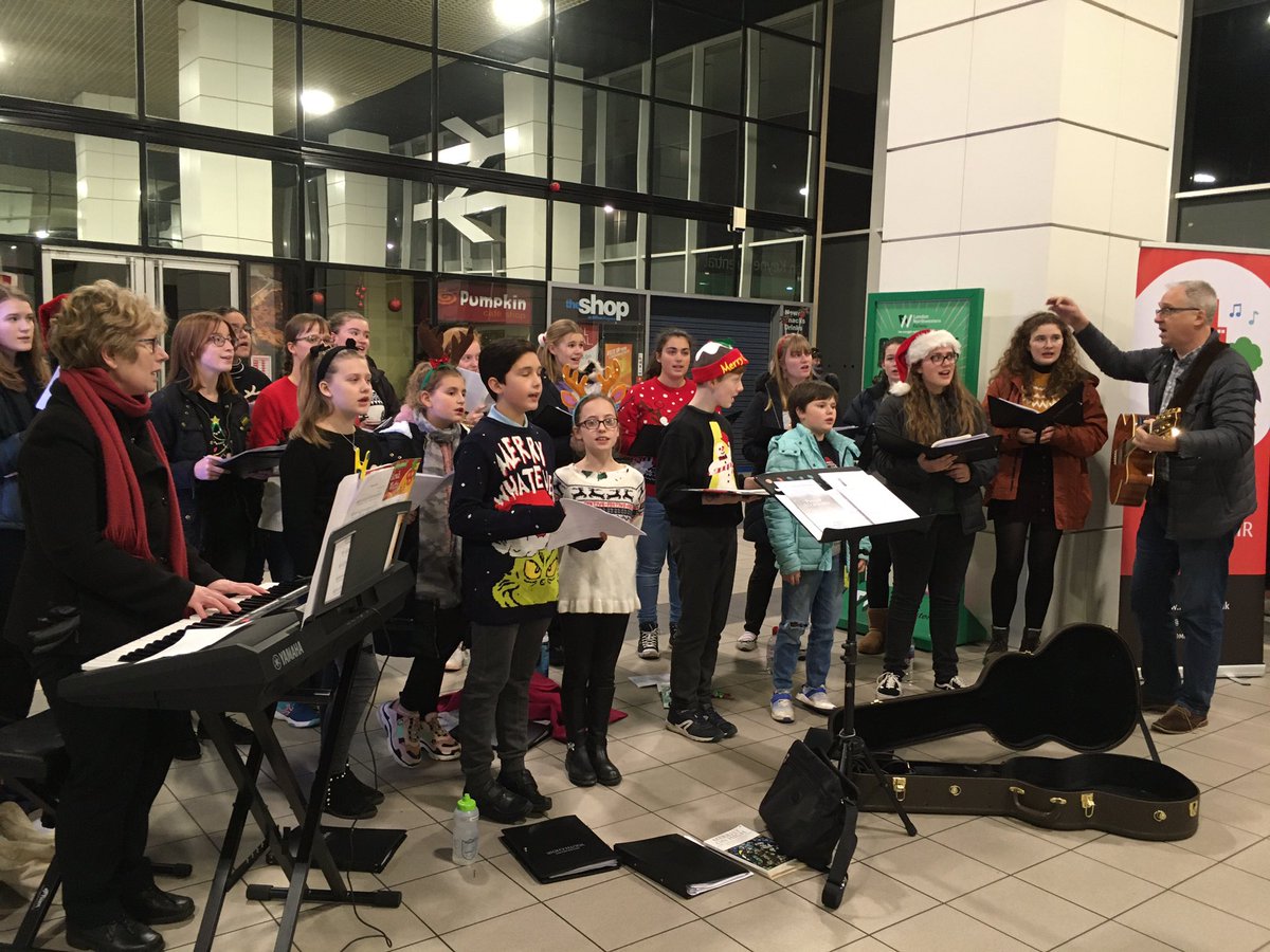 <a href="/MKYouthChoir/">MK Youth Choir</a> sounding tunefully festive for commuters at #MiltonKeynesStation #ChristmasJumperDay2019 #Christmas #ChristmasCarol #singing #choral