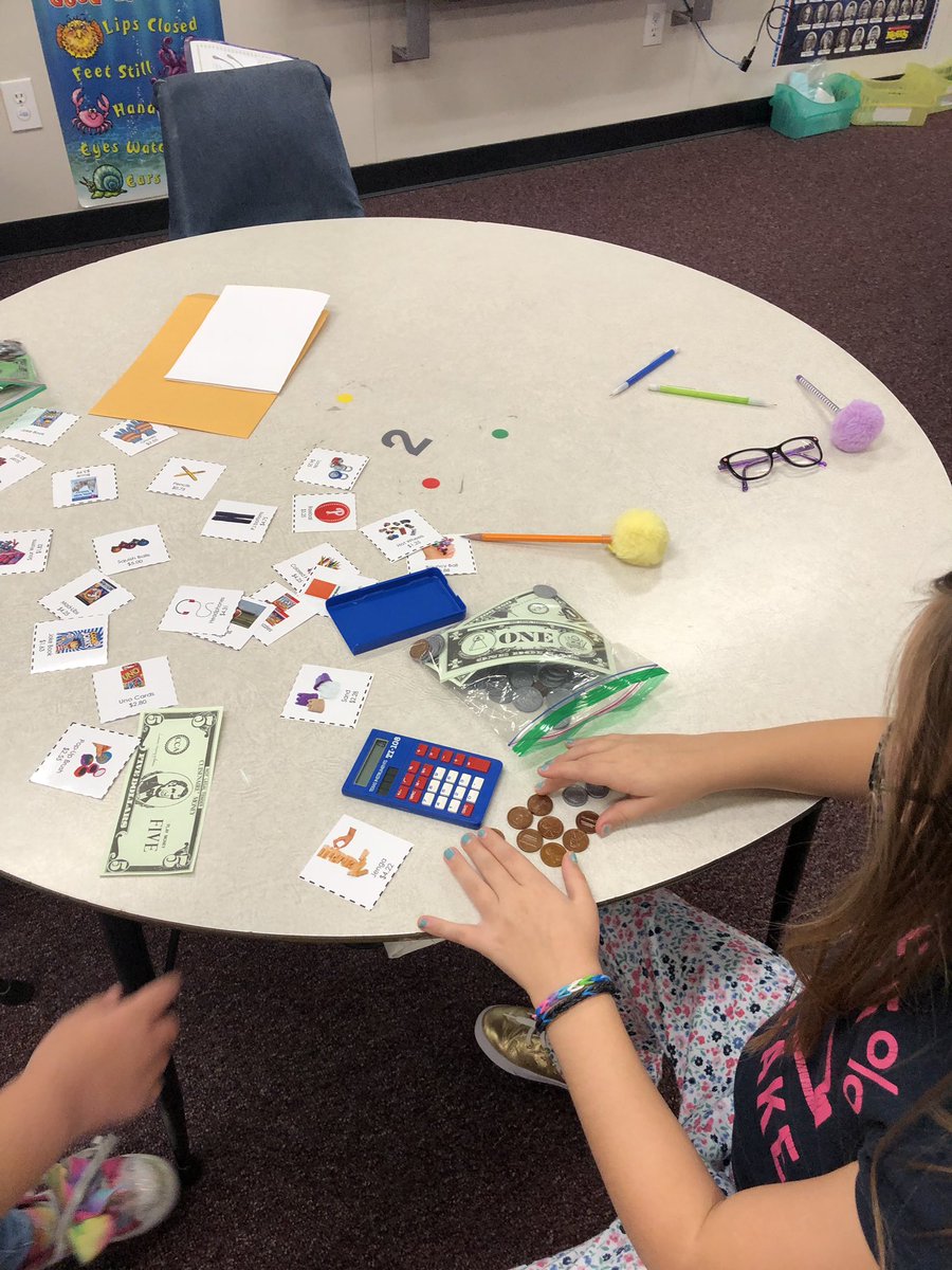 We are shopping and practicing how to give change back to our customers in Mrs. Vallerio’s room.