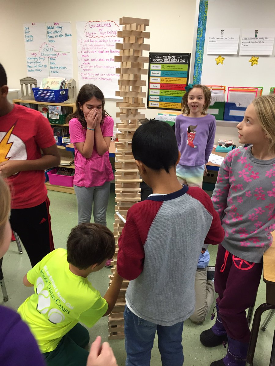 Engineering with Keva planks durning indoor recess.