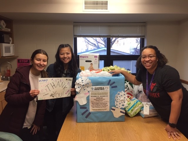 KStateAHS's tweet photo. The Early Childhood Student Association (ECSA) completed their diaper &amp; clothing drive for Lamb of God Early Childhood Ministry in Manhattan. They delivered 4 boxes of diapers, multiple bags of children’s clothing &amp; more! Thank you to all who donated to a wonderful local program! https://t.co/INR5xKULjm
